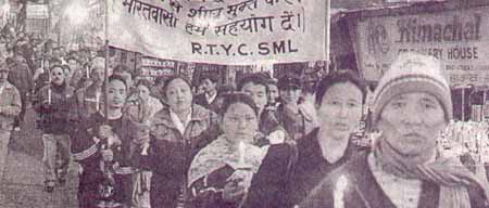 Members of the Tibetan Youth Congress,
  Tibetan Women's Association and Friends of Tibet (INDIA) holding a
  peaceful candlelight procession in Shimla on December 1, 2004.