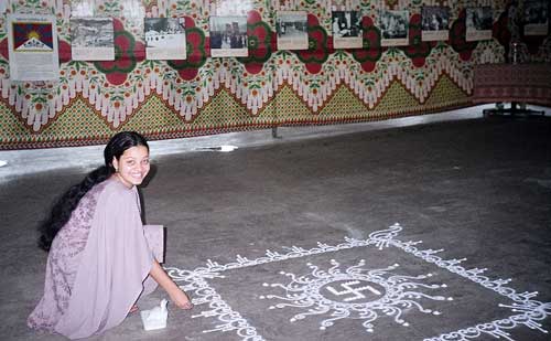 For the people of Ambernath, it was more than a photo exhibition on Tibet. Shraddha, an Ambernath-based TV-journalist prepares a traditional 'Rangoli' to welcome others.