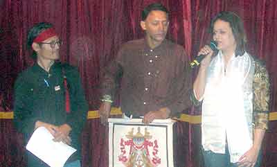  Piu Sarkar (Right) inaugurates 'Dances of the Yaks: A Tibet Evening' in Calcutta, West Bengal. Tenzin Tsundue and Tathogata Chakravati of Friends of Tibet next to her.